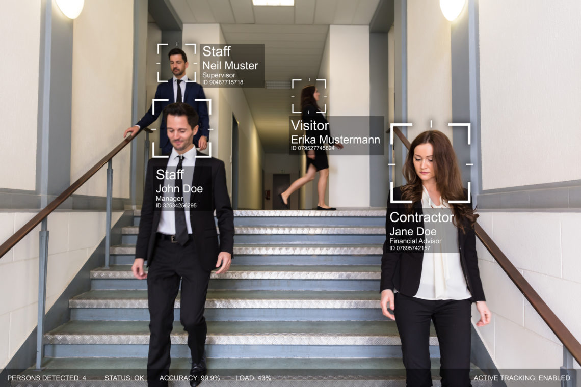 Businesspeople With Different Fields Walking In Office Premise Identified By Intellectual Learning System