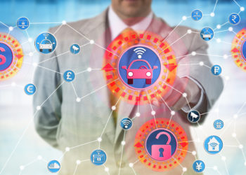 Unrecognizable industrial consultant is presenting a cyber-hijacking attack on autonomous control system for transportation. IT concept for cybercrime aimed at the internet of things and ransomware.