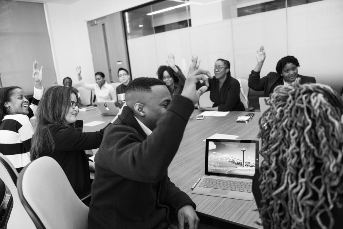 Photo by Christina Morillo from Pexels: https://www.pexels.com/photo/grayscale-photo-of-group-of-people-raises-hands-1181344/