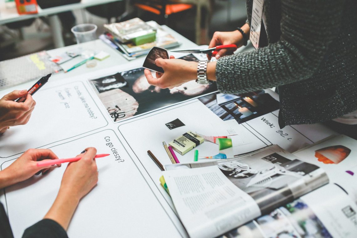 Photo by Kaboompics .com from Pexels: https://www.pexels.com/photo/working-in-a-group-6224/
