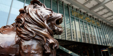 Hong Kong, China - January, 29 2011: Lion sculpture in front of Headquarter of HSBC in Hong Kong.