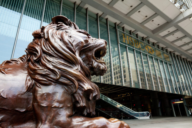 Hong Kong, China - January, 29 2011: Lion sculpture in front of Headquarter of HSBC in Hong Kong.