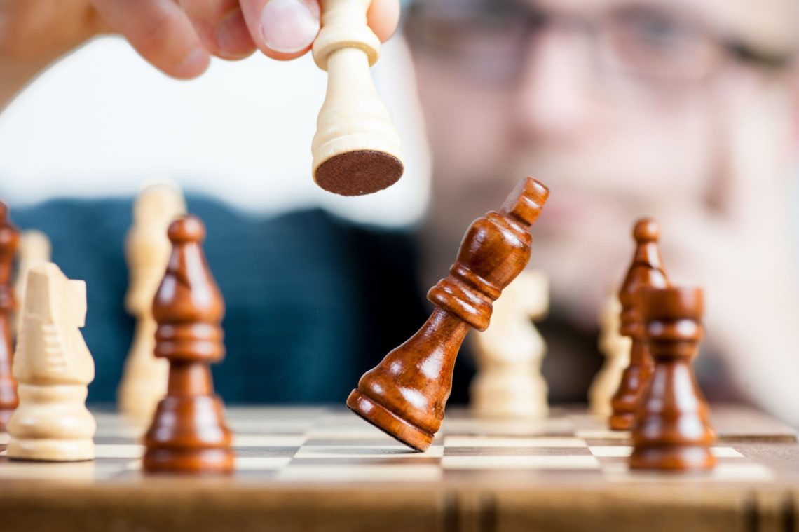 Photo by Pixabay from Pexels: https://www.pexels.com/photo/battle-board-game-castle-challenge-277124/
