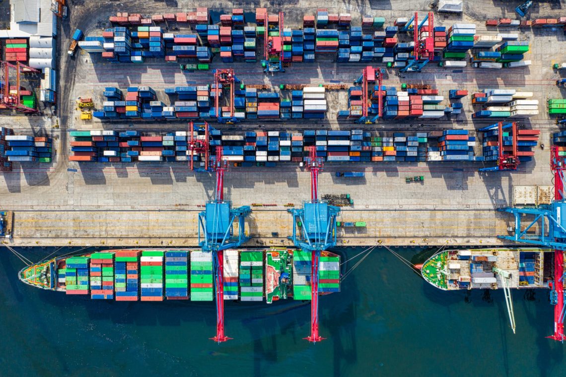 Photo by Tom Fisk from Pexels: https://www.pexels.com/photo/birds-eye-view-photo-of-freight-containers-2226458/