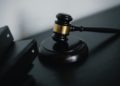 Photo by Sora Shimazaki from Pexels: https://www.pexels.com/photo/close-up-photo-of-wooden-gavel-5668473/