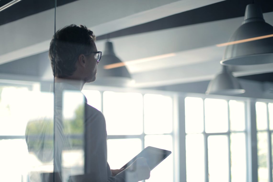 Photo by Andrea Piacquadio from Pexels: https://www.pexels.com/photo/formal-man-with-tablet-giving-presentation-in-office-3760093/