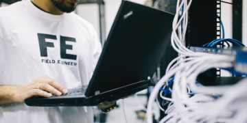 Photo by Field Engineer from Pexels: https://www.pexels.com/photo/serious-ethnic-field-engineer-examining-hardware-and-working-on-laptop-442152/