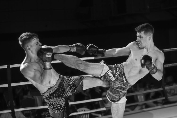 Photo by Vlad Dediu from Pexels: https://www.pexels.com/photo/men-fighting-in-the-ring-2581662/