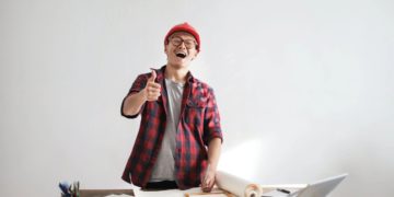 Photo by Andrea Piacquadio from Pexels: https://www.pexels.com/photo/laughing-male-constructor-showing-thumb-up-at-working-desk-3760613/