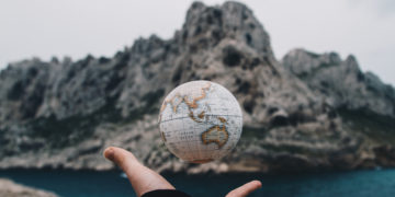 Photo by Valentin Antonucci from Pexels: https://www.pexels.com/photo/person-tossing-globe-1275393/