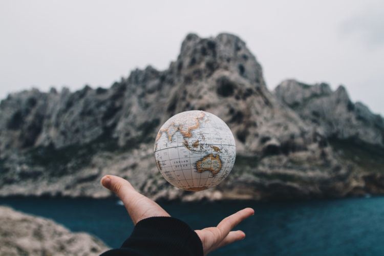 Photo by Valentin Antonucci from Pexels: https://www.pexels.com/photo/person-tossing-globe-1275393/