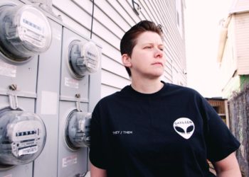 Photo by Shane from Pexels: https://www.pexels.com/photo/photo-of-a-woman-in-a-black-shirt-leaning-on-electrical-meters-4040488/