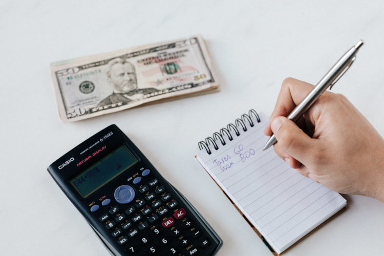 Photo by Karolina Grabowska from Pexels: https://www.pexels.com/photo/crop-anonymous-financier-planning-budget-writing-numbers-in-notebook-4386339/
