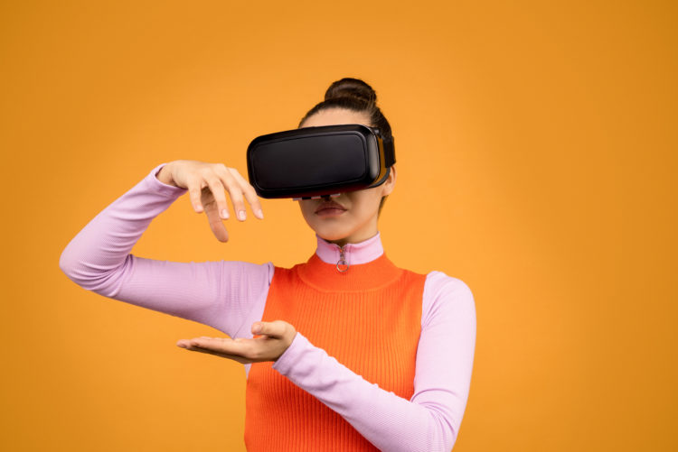 Photo by Sound On from Pexels: https://www.pexels.com/photo/woman-in-long-sleeve-shirt-wearing-black-vr-goggles-3761151/