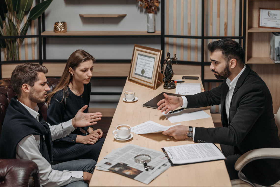 Photo by Pavel Danilyuk from Pexels: https://www.pexels.com/photo/male-lawyer-talking-to-his-clients-8112231/