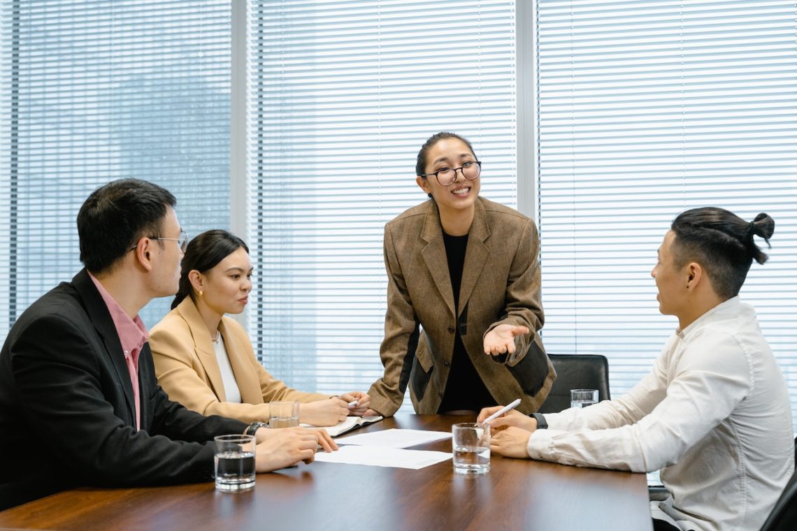 Photo by MART  PRODUCTION: https://www.pexels.com/photo/woman-wearing-eyeglasses-talking-at-the-meeting-7643872/