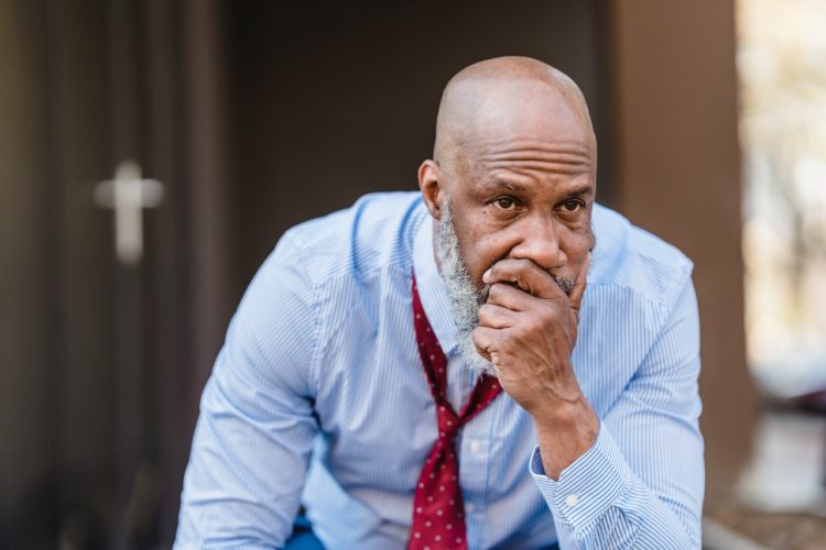Photo by Nicola Barts : https://www.pexels.com/photo/concerned-black-businessman-in-city-7925815/