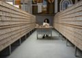 Photo by Tima Miroshnichenko: https://www.pexels.com/photo/a-girl-sitting-in-front-of-a-table-between-database-wooden-drawer-6549629/