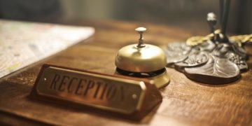 Photo by Andrea Piacquadio: https://www.pexels.com/photo/reception-desk-with-antique-hotel-bell-3771110/