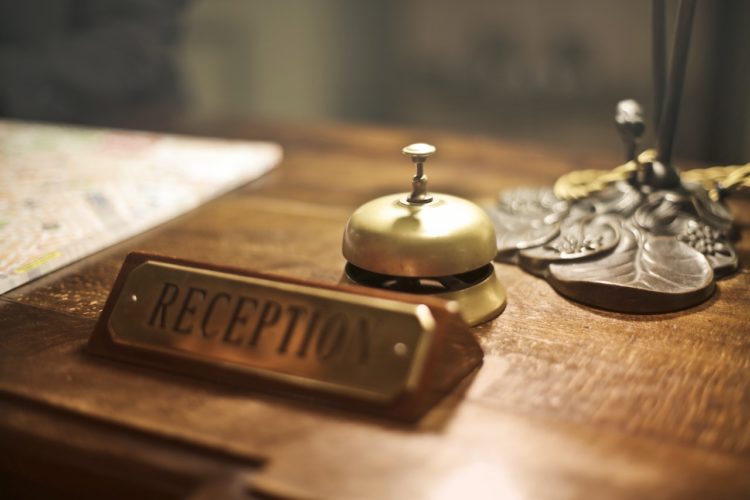 Photo by Andrea Piacquadio: https://www.pexels.com/photo/reception-desk-with-antique-hotel-bell-3771110/