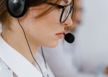Photo by MART  PRODUCTION: https://www.pexels.com/photo/woman-wearing-eyeglasses-with-black-headset-and-mouthpiece-7709262/