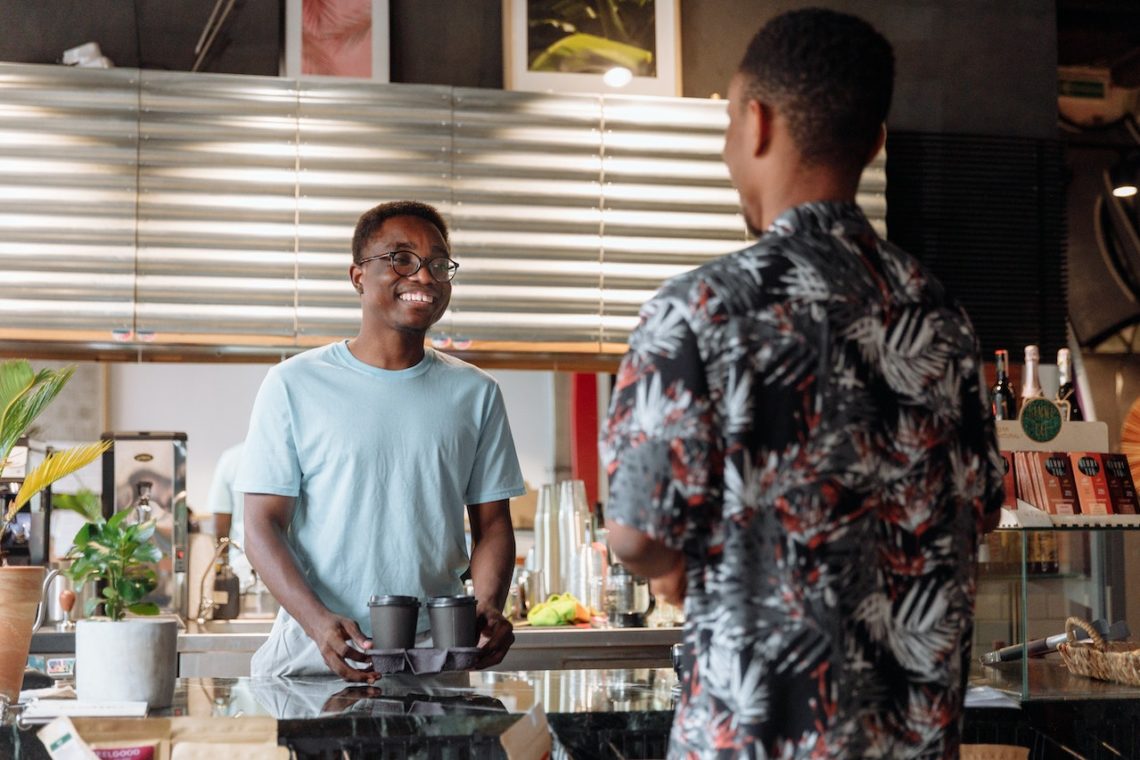 Photo by Thirdman: https://www.pexels.com/photo/a-man-standing-in-front-of-the-bar-counter-8936945/