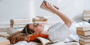Photo by George Milton: https://www.pexels.com/photo/young-smart-woman-reading-book-on-floor-7034697/