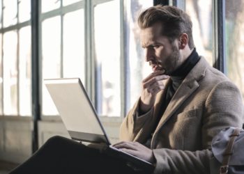 Photo by Andrea Piacquadio: https://www.pexels.com/photo/man-wearing-brown-jacket-and-using-grey-laptop-874242/