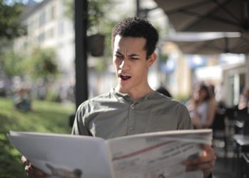 Photo by Andrea Piacquadio: https://www.pexels.com/photo/shallow-focus-photo-of-man-reading-newspaper-3799099/