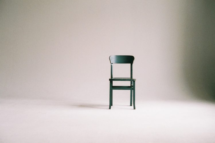Photo by Paula Schmidt: https://www.pexels.com/photo/wooden-chair-on-a-white-wall-studio-963486/