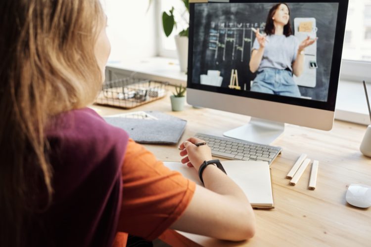 Photo by Julia M Cameron from Pexels: https://www.pexels.com/photo/photo-of-girl-watching-through-imac-4144222/