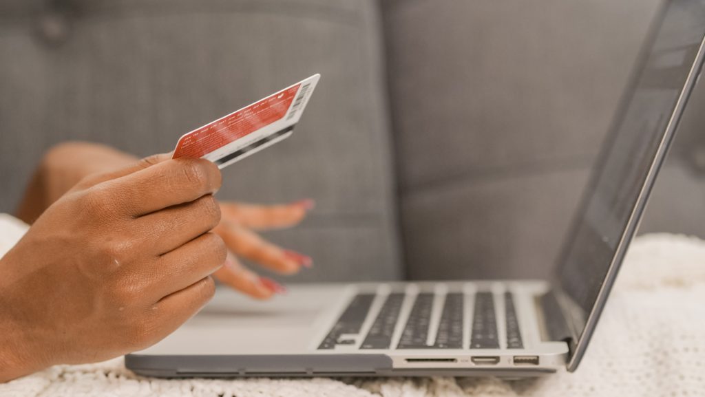 Photo by Kindel Media: https://www.pexels.com/photo/person-holding-credit-card-doing-online-shopping-6995252/