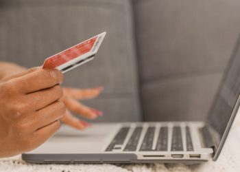 Photo by Kindel Media: https://www.pexels.com/photo/person-holding-credit-card-doing-online-shopping-6995252/