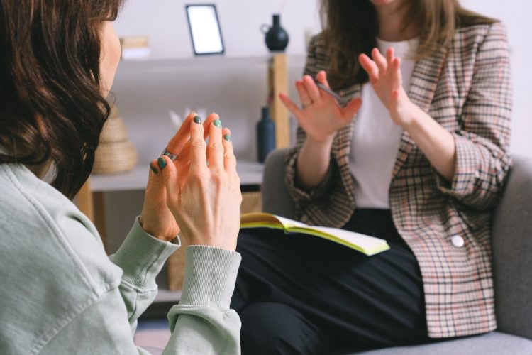 Photo by SHVETS production: https://www.pexels.com/photo/crop-unrecognizable-female-psychologist-and-patient-discussing-mental-problems-during-session-7176319/