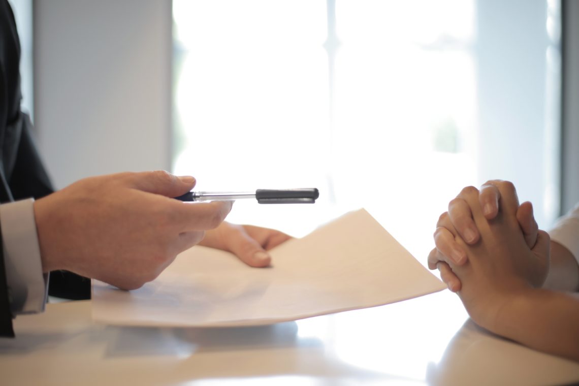 Photo by Andrea Piacquadio: https://www.pexels.com/photo/crop-businessman-giving-contract-to-woman-to-sign-3760067/