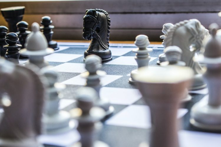 Photo by HARUN BENLİ: https://www.pexels.com/photo/chessboard-game-3701276/