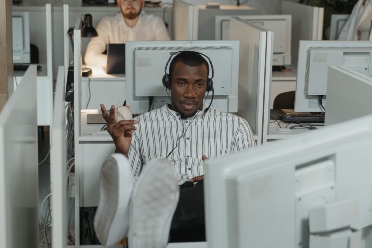 Photo by Tima Miroshnichenko from Pexels: https://www.pexels.com/photo/man-wearing-headphones-while-working-in-call-center-office-5453848/