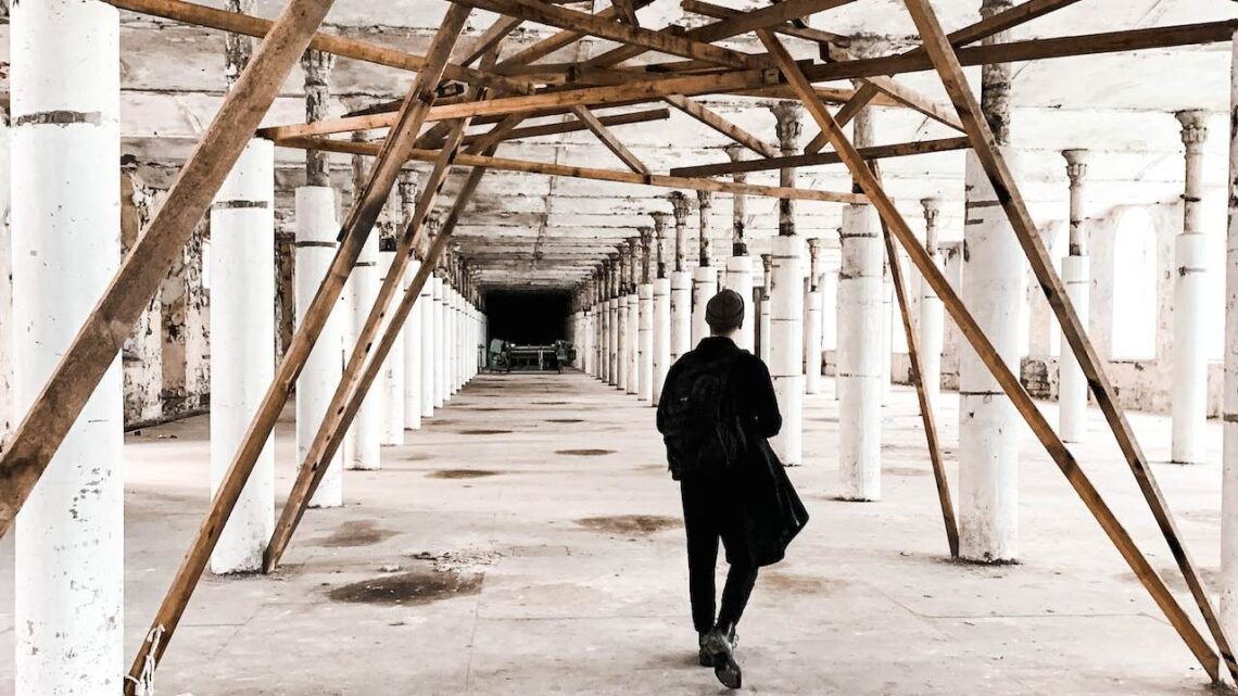 Photo by Marlene Leppänen: https://www.pexels.com/photo/unrecognizable-man-walking-in-building-corridor-under-reconstruction-5305811/