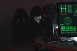 Photo by Tima Miroshnichenko: https://www.pexels.com/photo/person-wearing-a-mask-sitting-on-chair-while-using-a-computer-5380605/