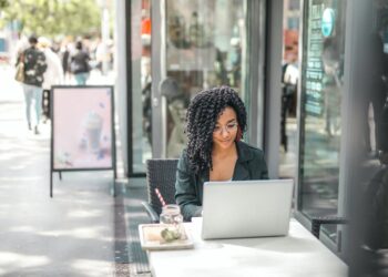 Photo by Andrea Piacquadio: https://www.pexels.com/photo/ethnic-young-woman-using-laptop-while-having-tasty-beverage-in-modern-street-cafe-3768894/