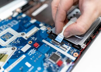 Photo by IT services EU: https://www.pexels.com/photo/close-up-of-man-repairing-a-computer-7639374/