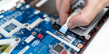 Photo by IT services EU: https://www.pexels.com/photo/close-up-of-man-repairing-a-computer-7639374/