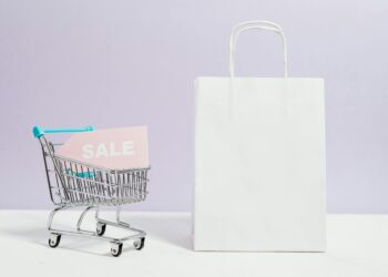 Photo by Karolina Grabowska: https://www.pexels.com/photo/sale-sign-in-a-miniature-shopping-cart-and-paper-bag-5632398/