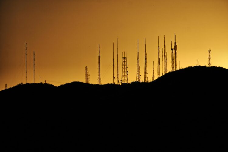 Photo by Troy Squillaci: https://www.pexels.com/photo/silhouette-photo-of-transmission-tower-on-hill-2525871/