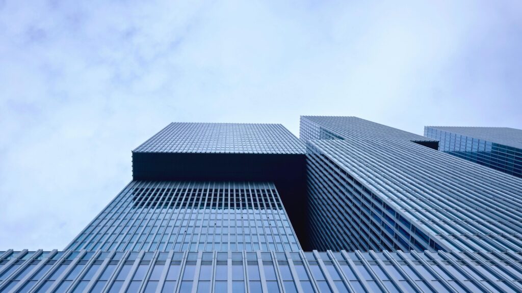 Photo by Matthias Zomer: https://www.pexels.com/photo/low-angle-view-of-office-building-against-sky-313736/