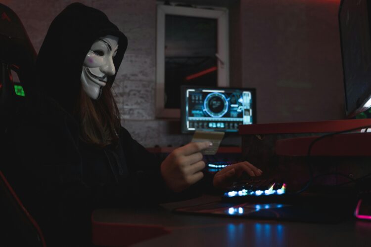 Photo by Tima Miroshnichenko: https://www.pexels.com/photo/woman-in-black-hoodie-holding-a-bank-card-5380665/