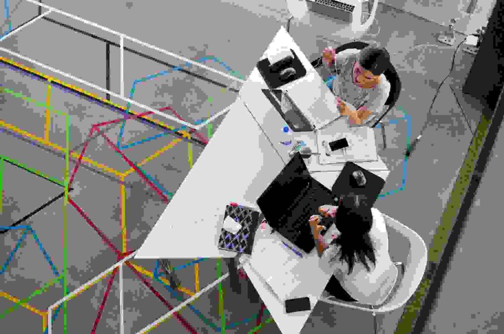 Photo by Visual Tag Mx: https://www.pexels.com/photo/two-women-sitting-in-chairs-using-laptop-computers-2566573/