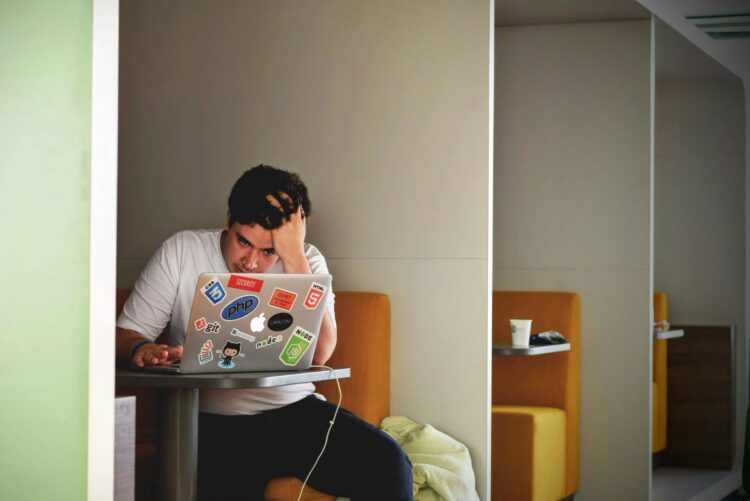 Photo by Tim Gouw: https://www.pexels.com/photo/man-in-white-shirt-using-macbook-pro-52608/