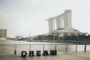 Photo by Elina Sazonova: https://www.pexels.com/photo/dream-lettering-near-fence-overlooking-marina-bay-sands-building-1907049/