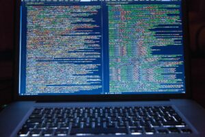 Photo by Markus Spiske: https://www.pexels.com/photo/black-laptop-computer-turned-on-showing-computer-codes-177598/